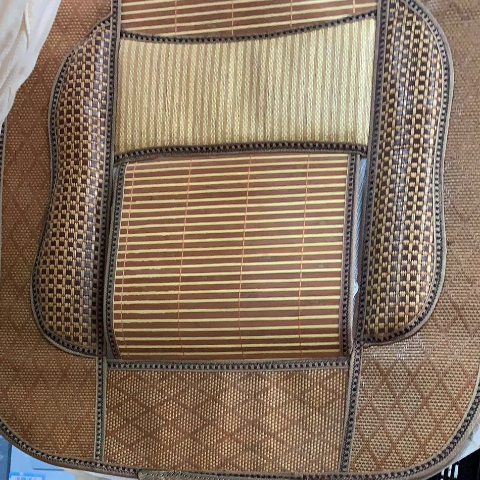 A pair of universal papyrus car seat cushions