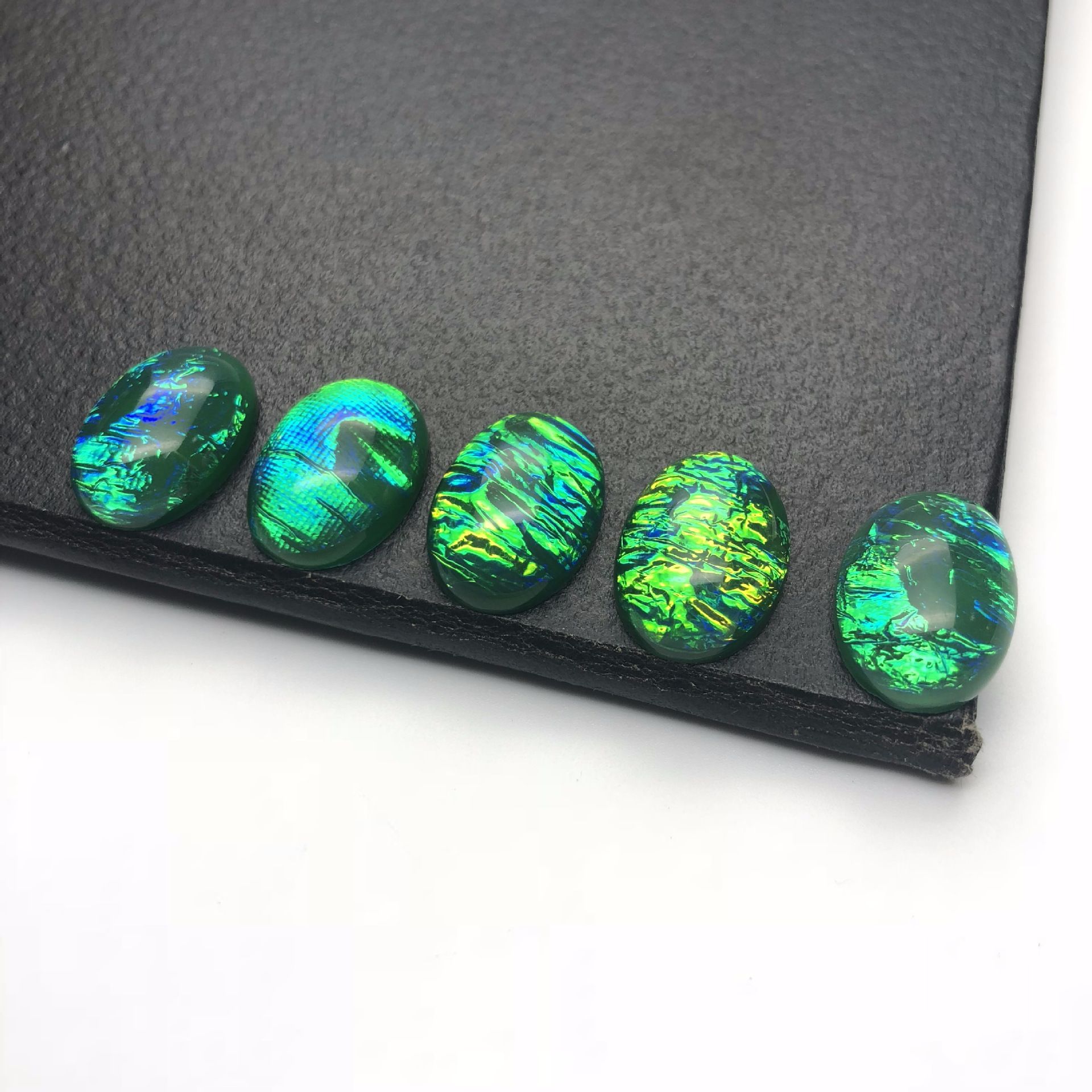 Factory direct sales of flat-bottomed resin ring face, diy material, oval 13*18, dreamy color-changing multi-color luggage accessories Application Scenario