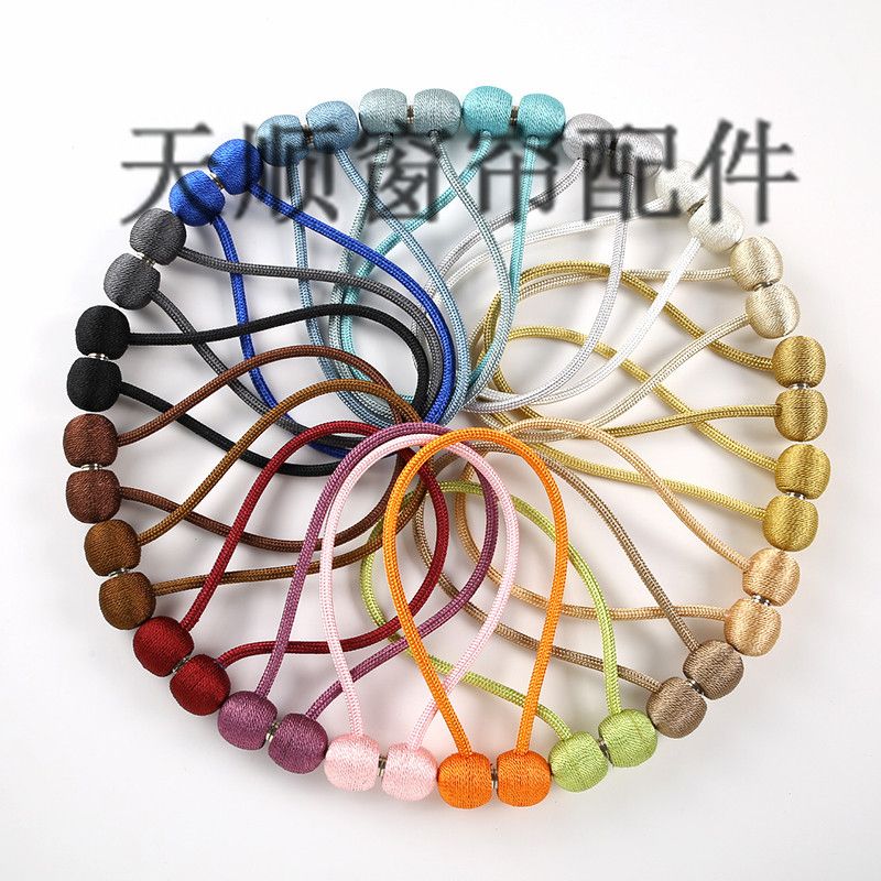 A pair of curtain straps, magnetic fasteners, binding straps, ropes, magnetic curtain fasteners, hooks, decorative accessories