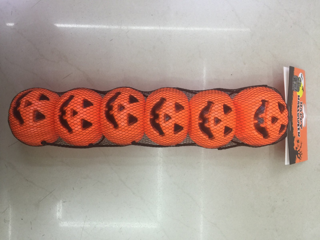 Six pumpkins in net bags