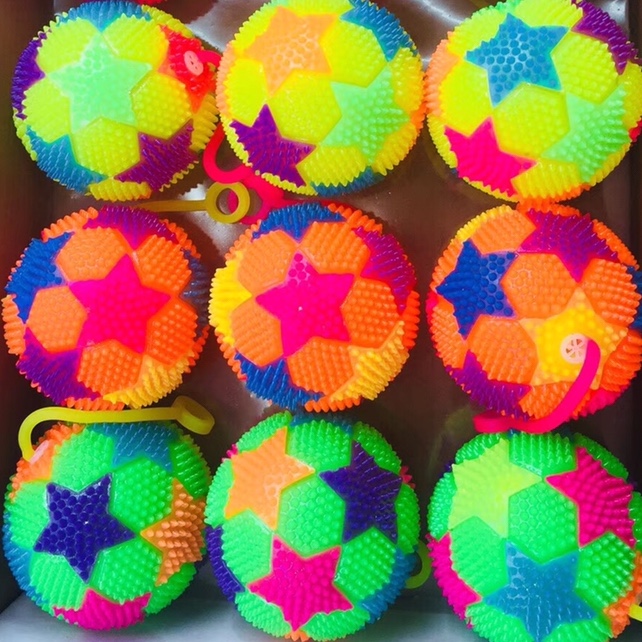 Ball with rope and whistle called ball massage ball five planets