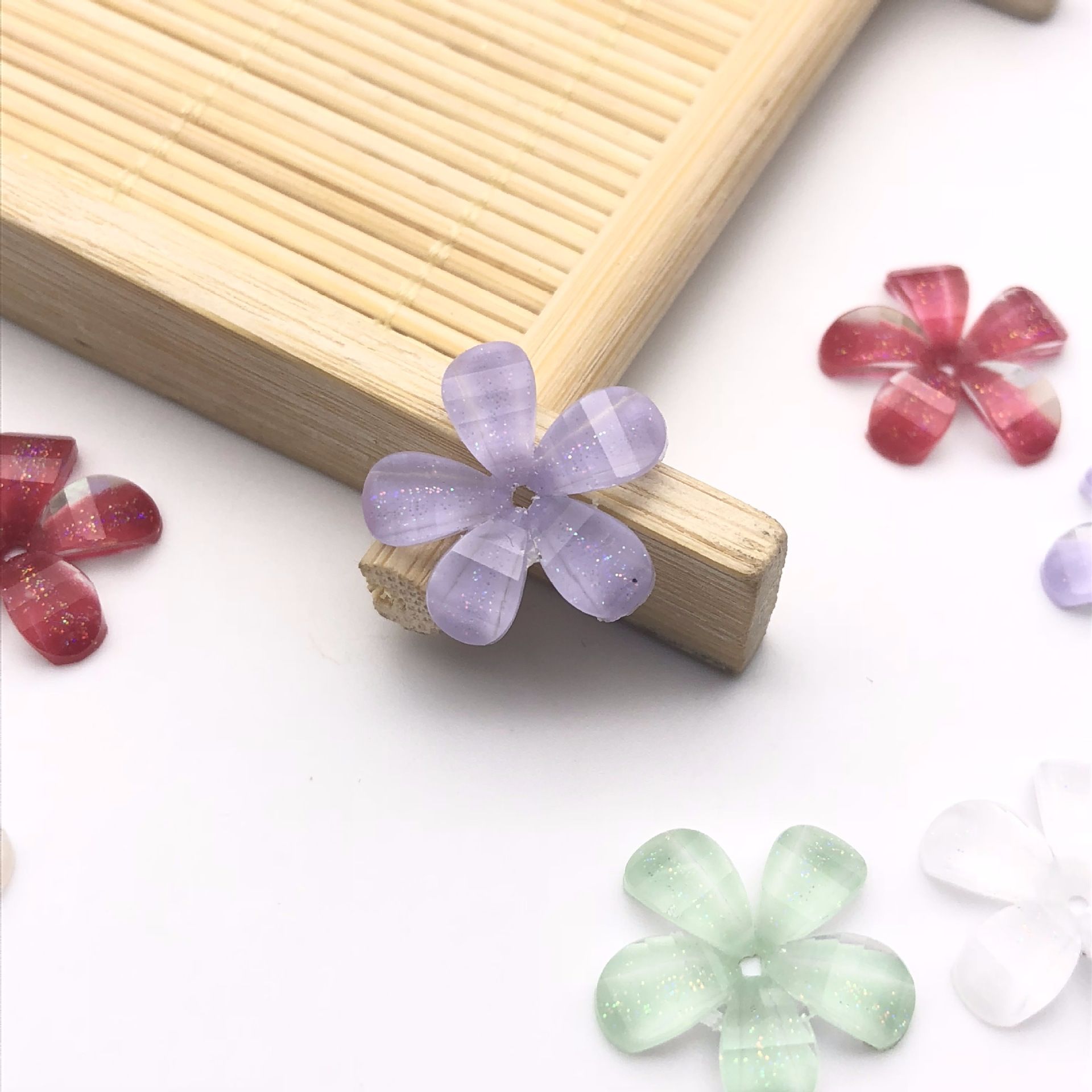Finely crafted five-petal resin flower 16mm cherry blossom inlaid with glitter, handcrafted diy material phone case and accessory Application Scenario
