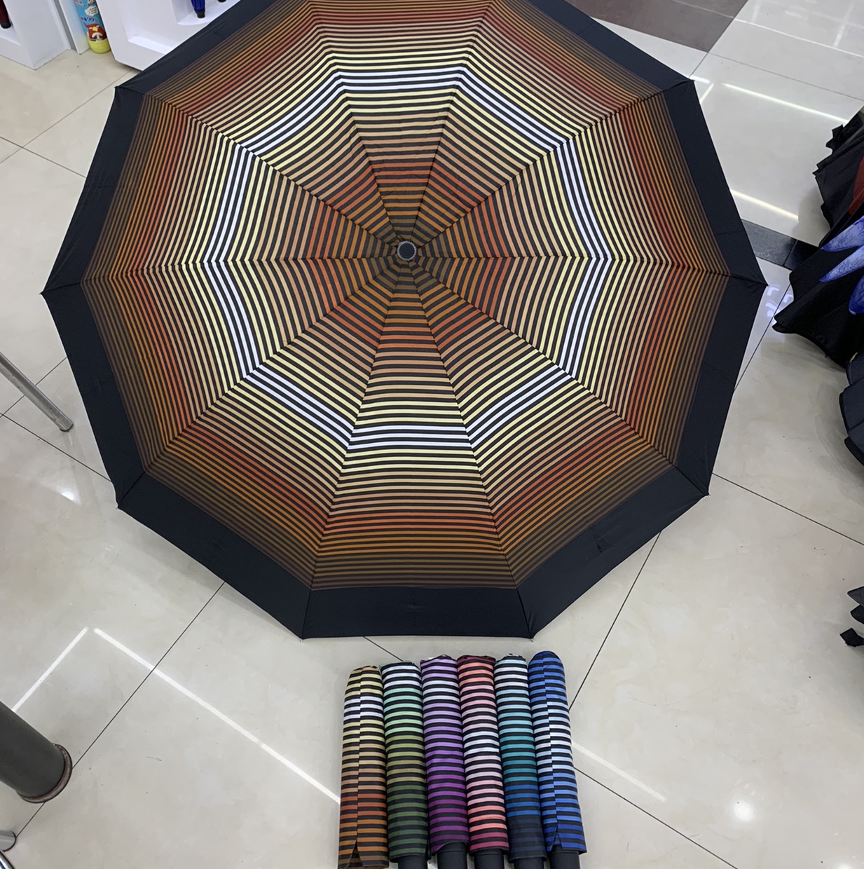 70*10K外翻手开天堂版渐变色横条三折晴雨伞加粗骨架六色可选