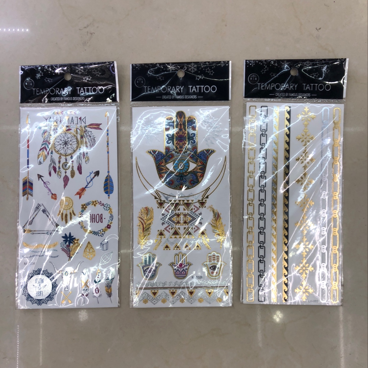 Tattoo烫金彩金系列 size：21x19.2cm opp