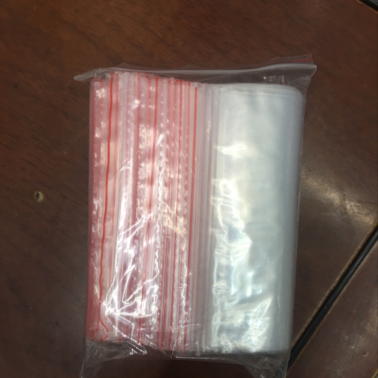 Wholesale plastic self-sealing bag packaging: 12*17=100