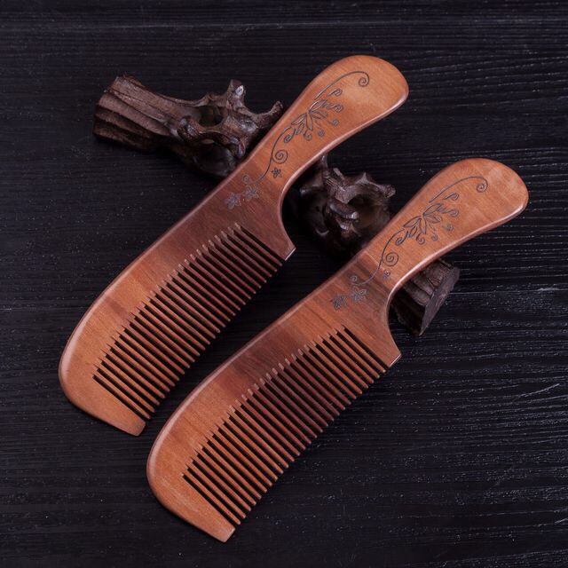 Factory direct sale of extra-large handle exquisite carved peach wood comb 21-7, anti-static, the first choice for home use