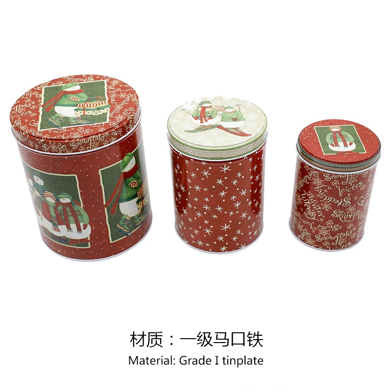 A set of three cylindrical Cans A Christmas gift can a tin can a biscuit tin a candy tin