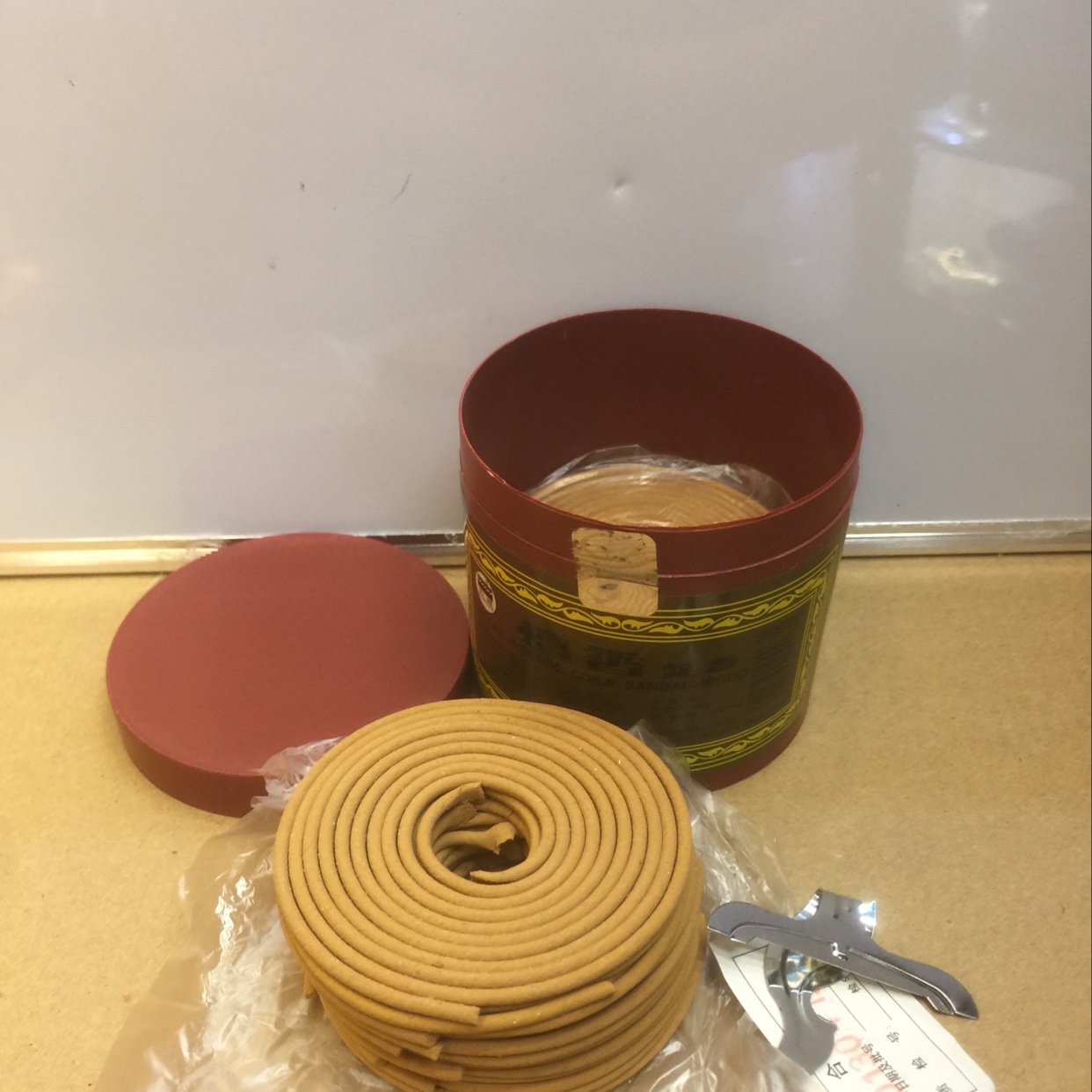 Small plastic sandalwood incense coil details Picture