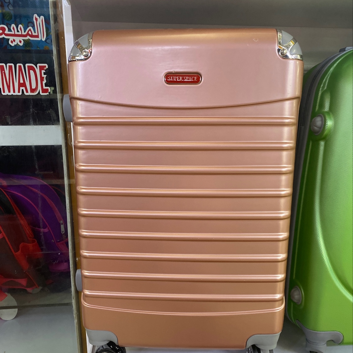 24寸粉色pc材质拉杆箱旅行箱