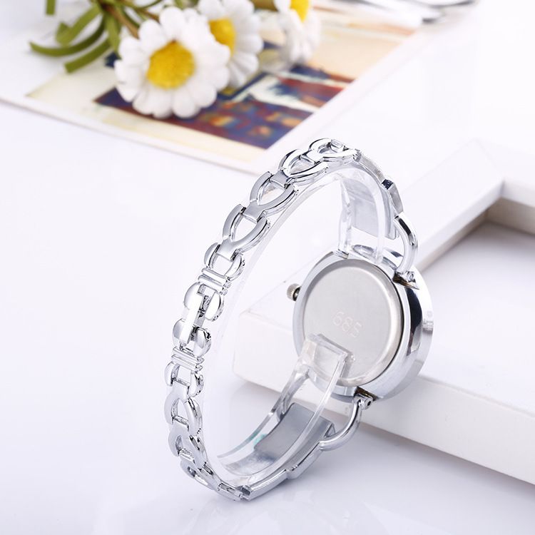 新款女士镶钻石英表外贸手表情侣玫瑰金合金时尚石英表出口手表白底实物图