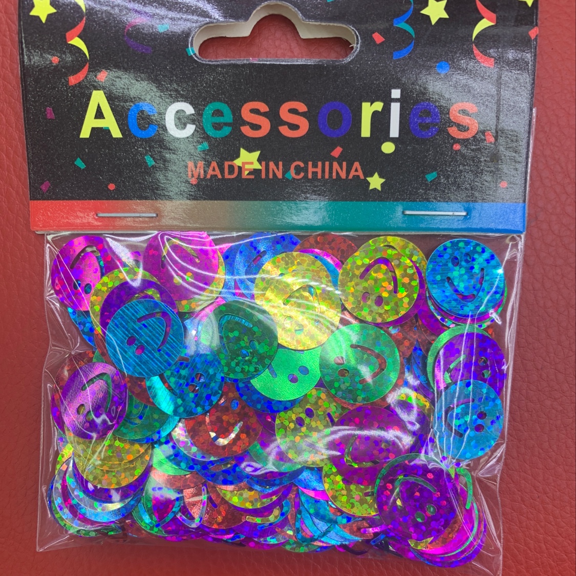 Smiling face sequin