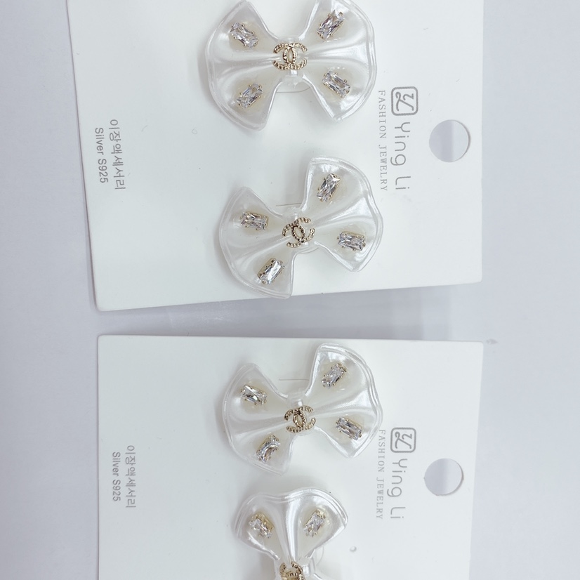Silver Needle Earrings With Bow