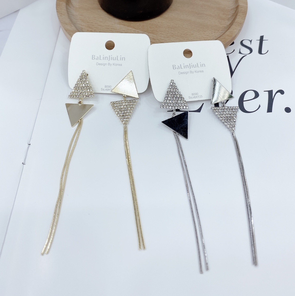 Triangular geometric earrings are fashionable and versatile