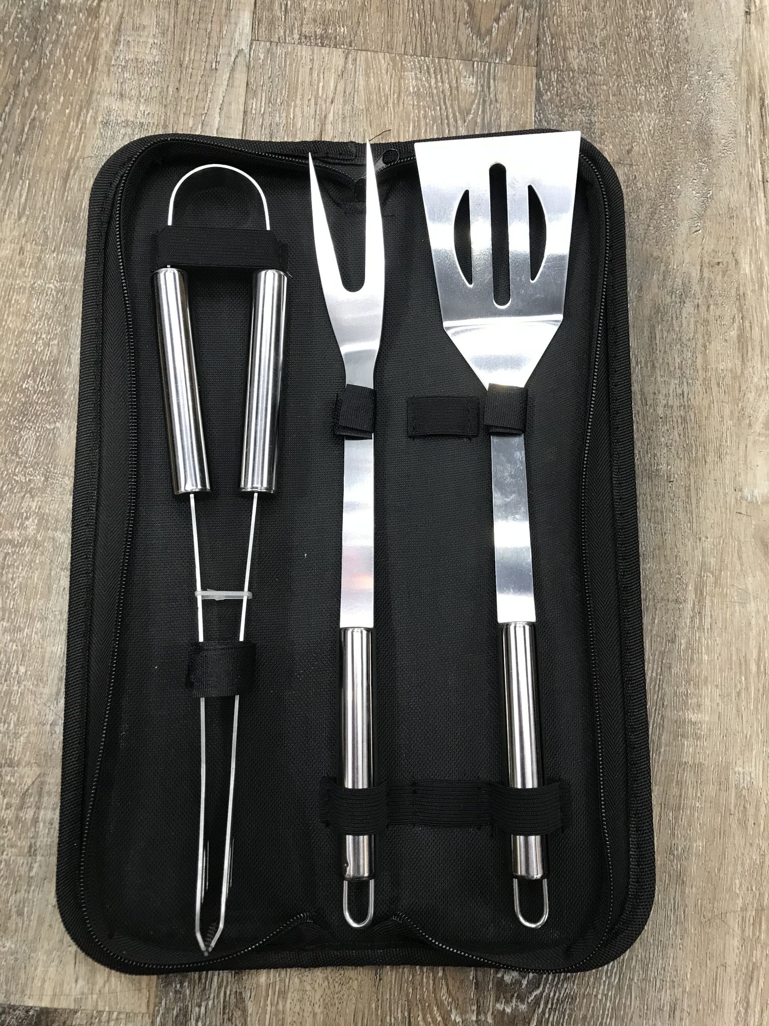 Three-piece set of outdoor household barbecue tools: barbecue spatula, barbecue fork, barbecue tongs, and barbecue tool cloth bags