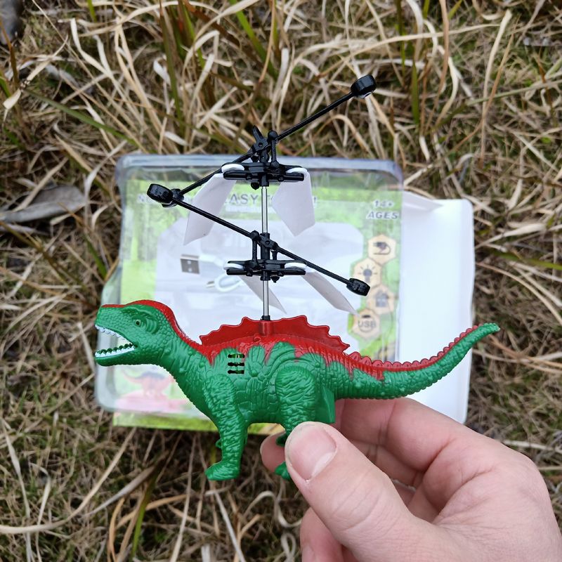 Stall dinosaur sensor aircraft remote control floating crystal ball children's toys