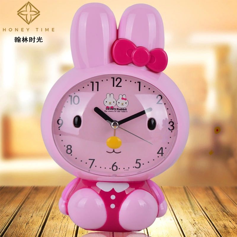 厂家直销 创意时尚长耳兔静音闹钟 产地货源夜光灯儿童卡通时钟