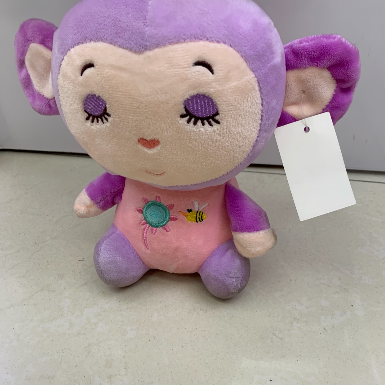 Wholesale of purple monkey plush toys and figurines featuring the Chinese zodiac sign monkey