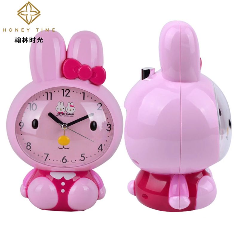 厂家直销 创意时尚长耳兔静音闹钟 产地货源夜光灯儿童卡通时钟白底实物图