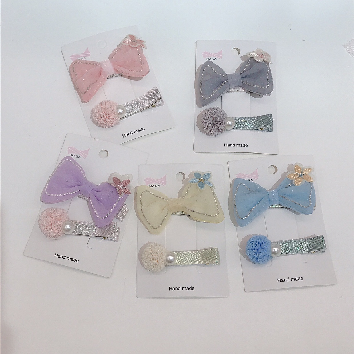 Embroidered bowknot children's hairpin thumbnail