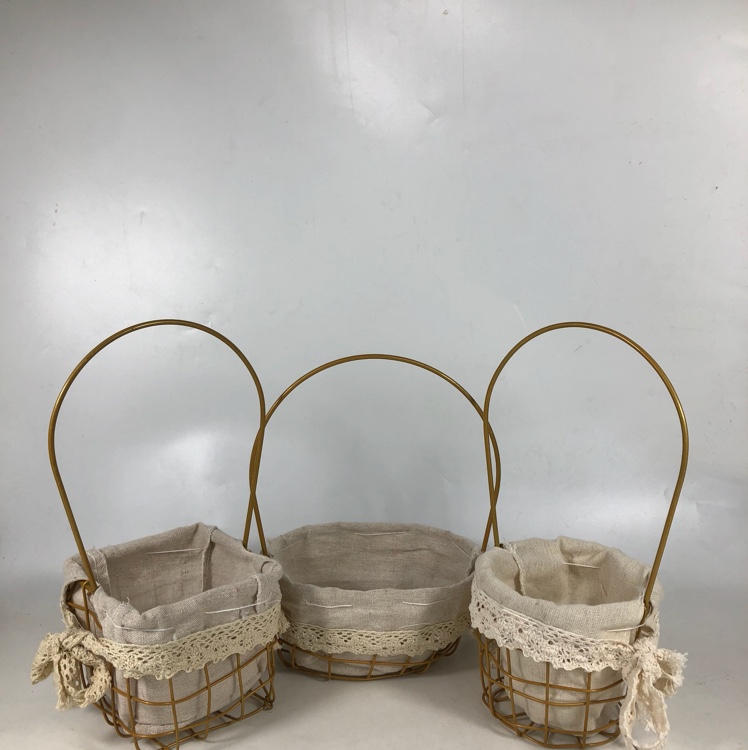 A small golden ironwork basket