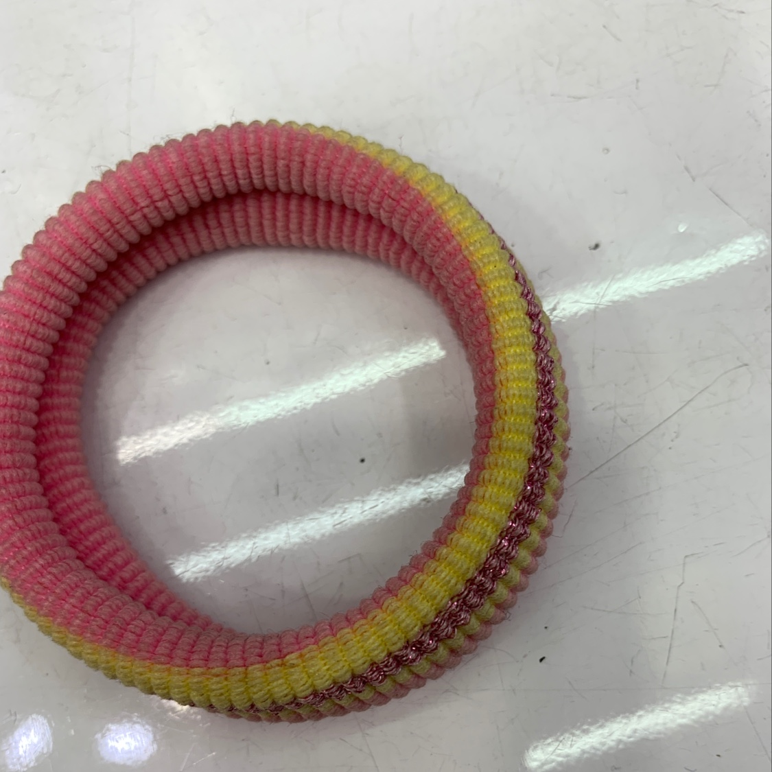 Stripes and filaments with hair rings