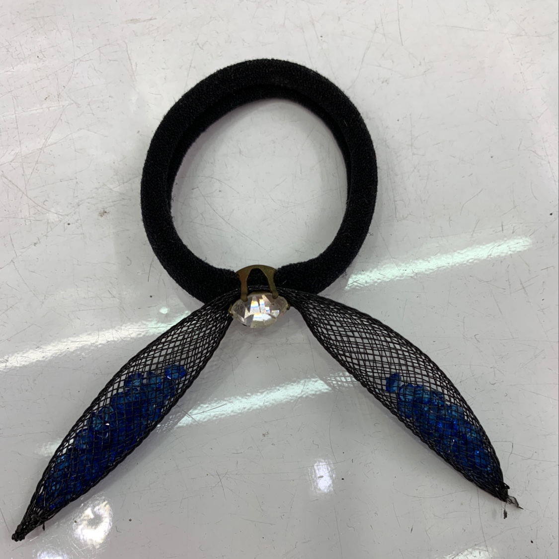 Versatile rabbit ear rubber band thumbnail