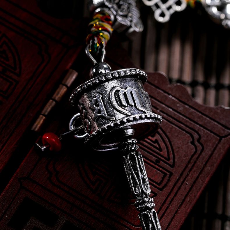 Wholesale of ethnic religious ritual implements, prayer wheels, amulets, cross-border jewelry accessories, waist tags, and car interior pendants details Picture