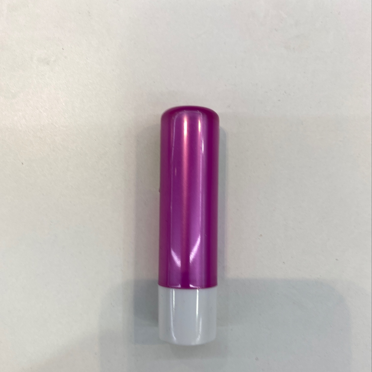 Purple lipstick tube