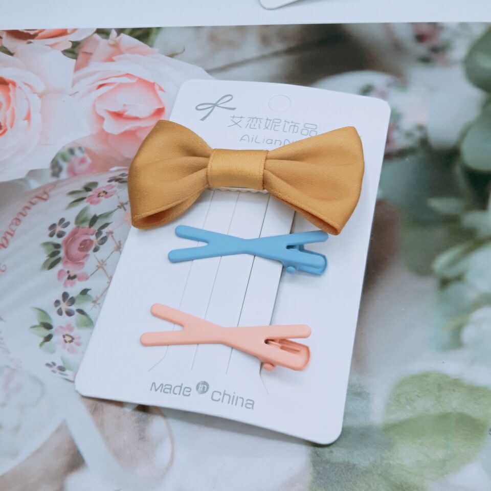 Acrylic hair clips, side clips, triangular bow tie press clips, hair clip clips, bangs clips, and hair styling set clips Application Scenario