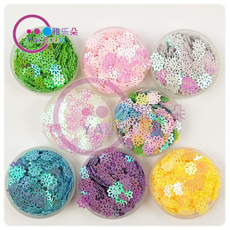 9mm hollowed-out through-flower sequins, eight-petal plum bead sequins, children's perforated amblyopia training diy accessory materials, clothing accessories Item Picture