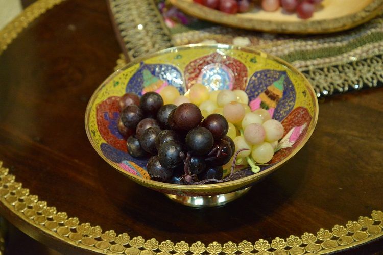 A large copper fruit plate with eight auspicious signs hand-painted in India Application Scenario