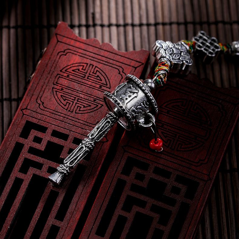 Wholesale of ethnic religious ritual implements, prayer wheels, amulets, cross-border jewelry accessories, waist tags, and car interior pendants Application Scenario