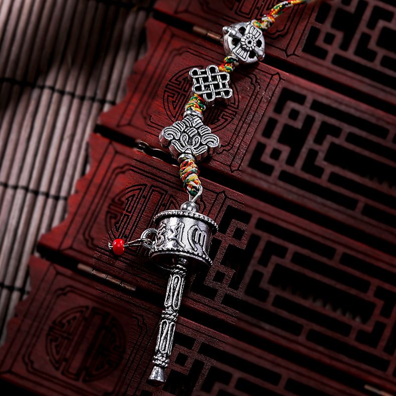 Wholesale of ethnic religious ritual implements, prayer wheels, amulets, cross-border jewelry accessories, waist tags, and car interior pendants