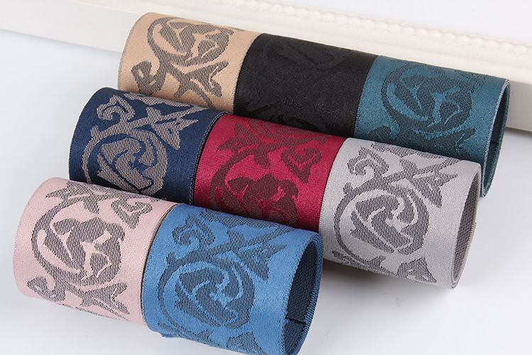 Dingxin, a manufacturer of high-quality Korean woven ribbons and Japanese jacquard fabric lace ribbons, offers direct sales and export for 100Y