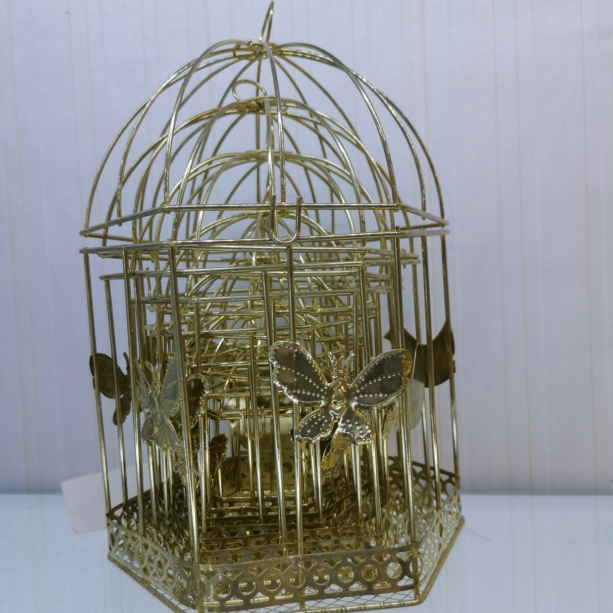 A set of 6 hexagonal butterfly cages plated in gold thumbnail
