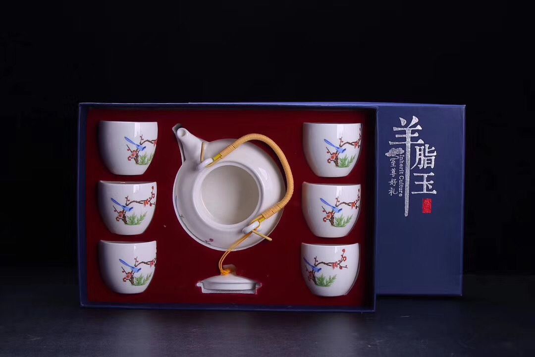 Modern simple white porcelain teapot and teacup thumbnail
