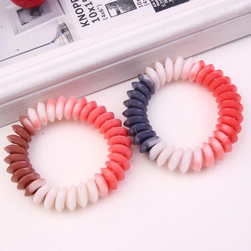 Dyed white triangle telephone wire hair loop