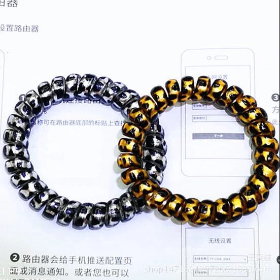 Gold and silver leopard line telephone rings thumbnail