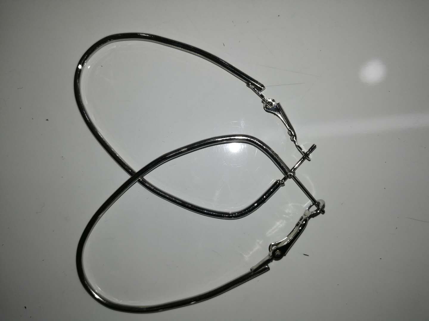 Aperture shaped egg earrings thumbnail