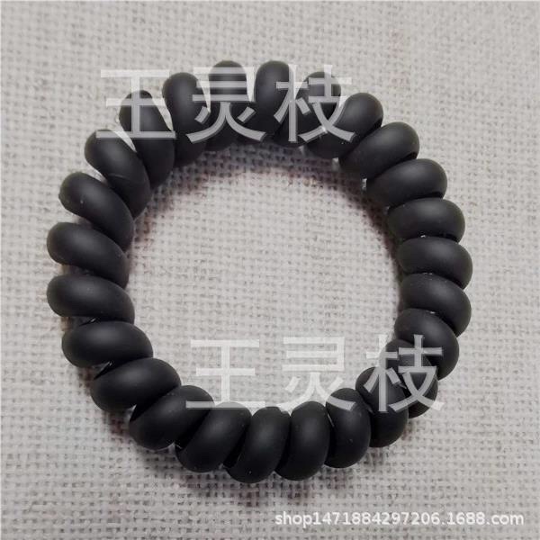 Spray-painted black bracelet telephone wire ring