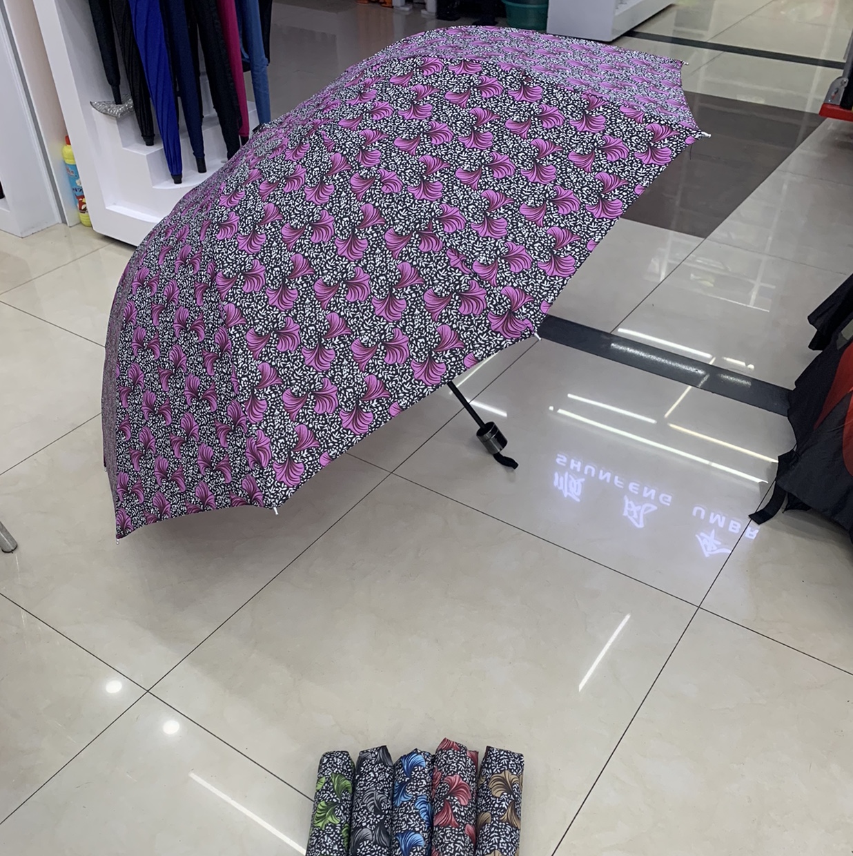 70*10K三折外翻牵牛花碰击布手开晴雨伞产品图