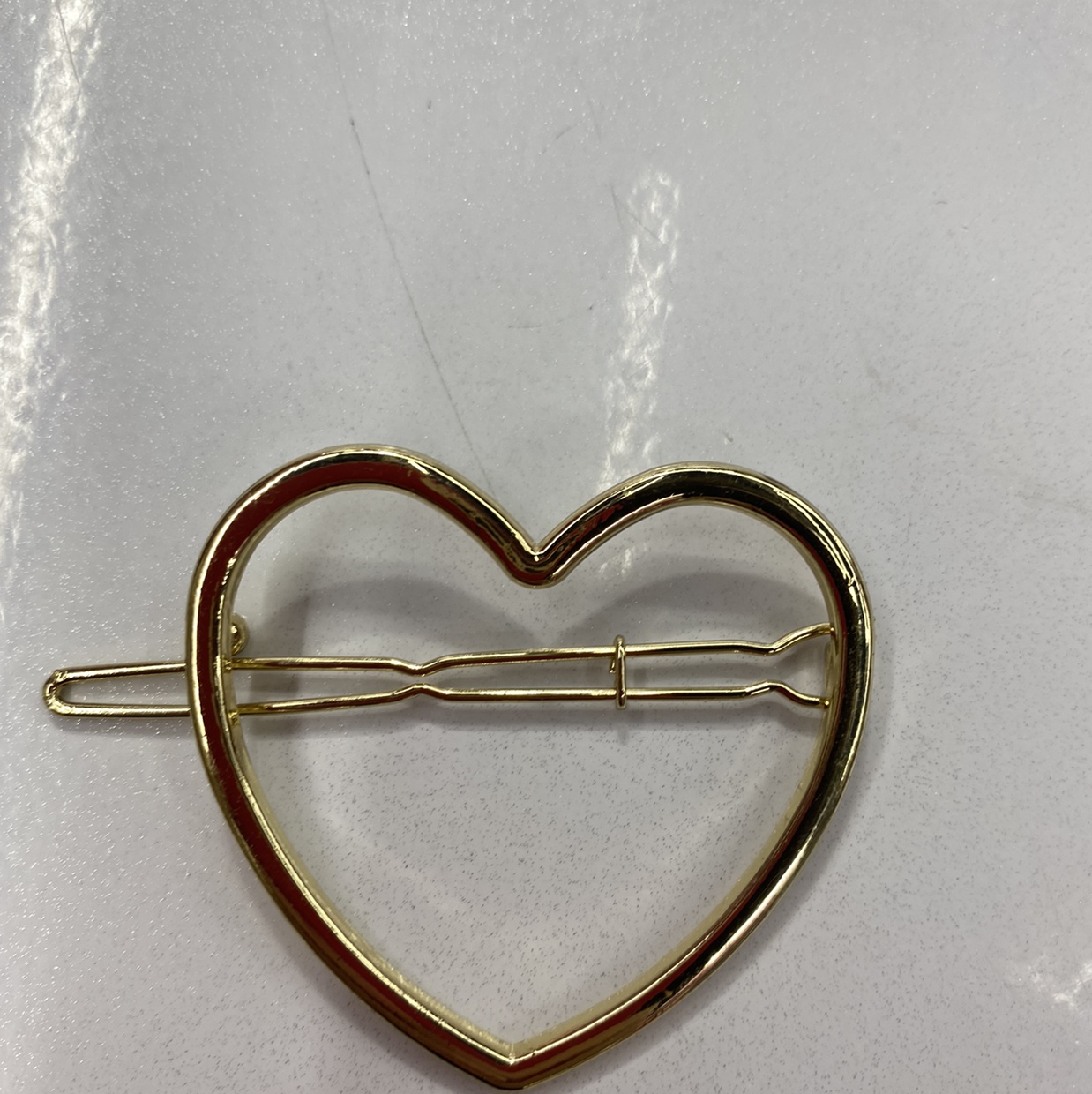 Heart-to-heart frog button