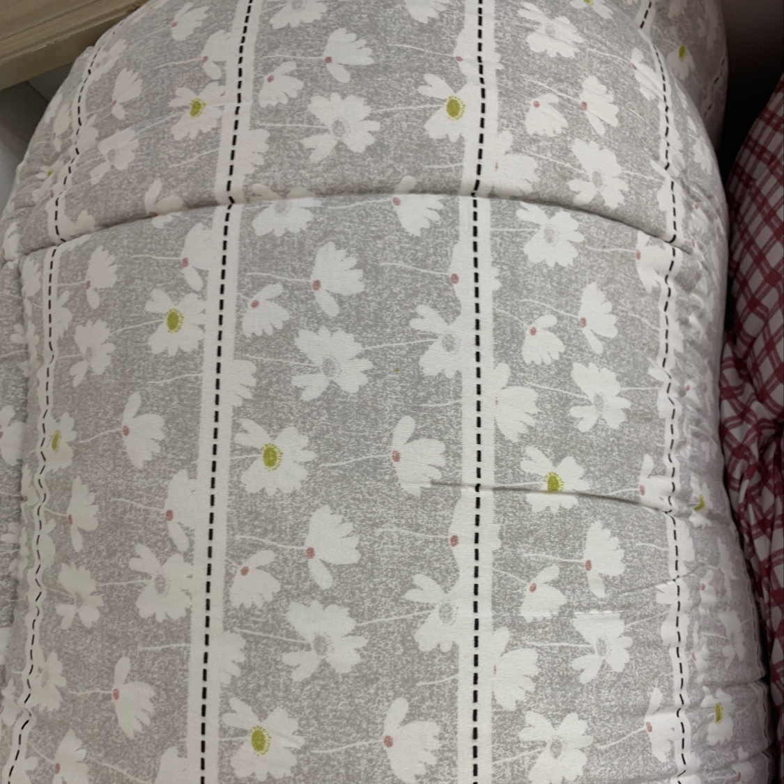 The quilt is cheaper.
