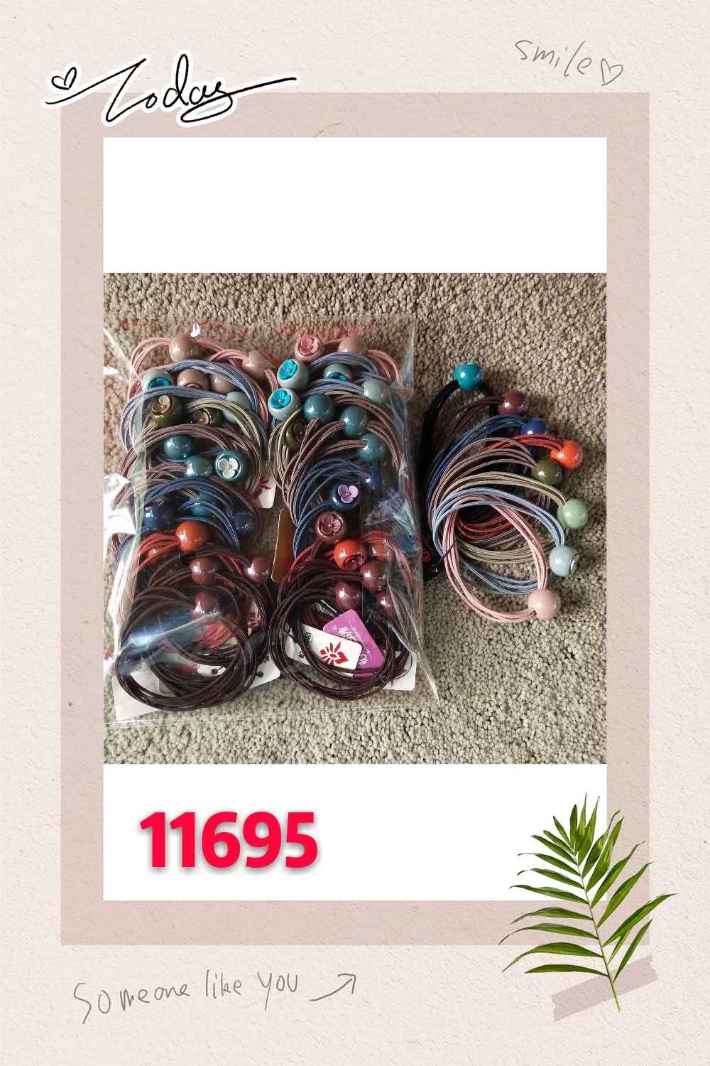 11695