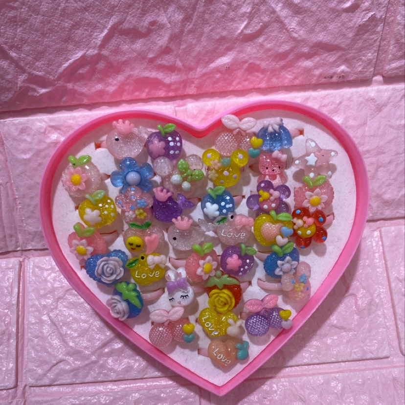 36 transparent rings in a heart-shaped box thumbnail