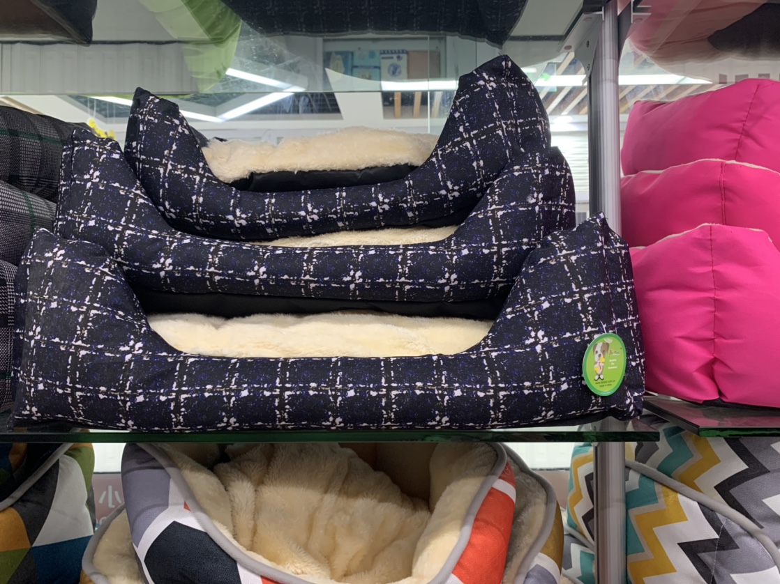 Black and purple checkered pet bed