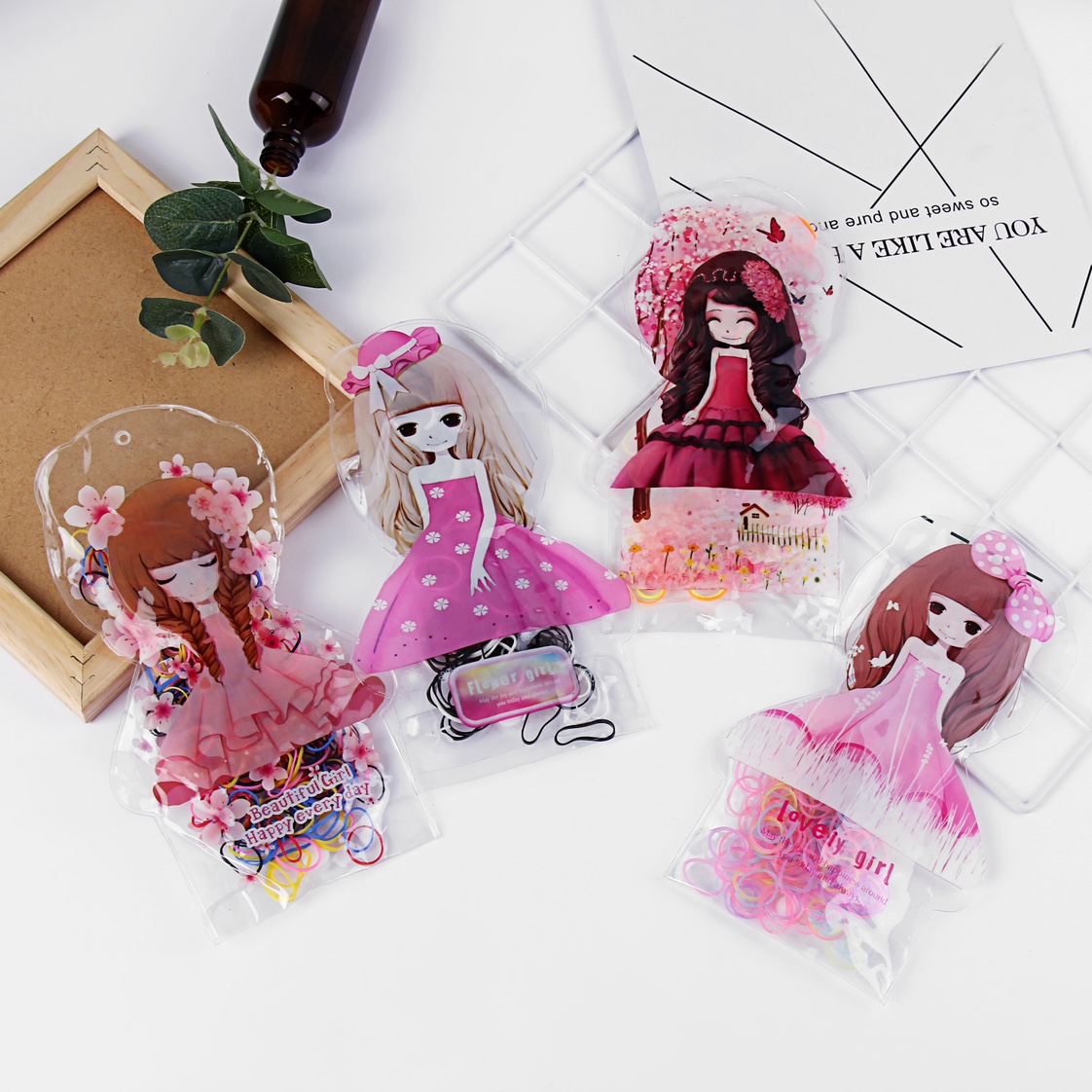 Girl-shaped bag, colorful small rubber bands, strong and unbreakable shaped card, colorful small rubber bands, chicken bag packaging, colorful small rubber bands