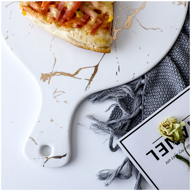 A modern and fashionable Nordic-style marble-patterned gold frosted ceramic round pizza, dessert plate and Western dining plate detail image 1