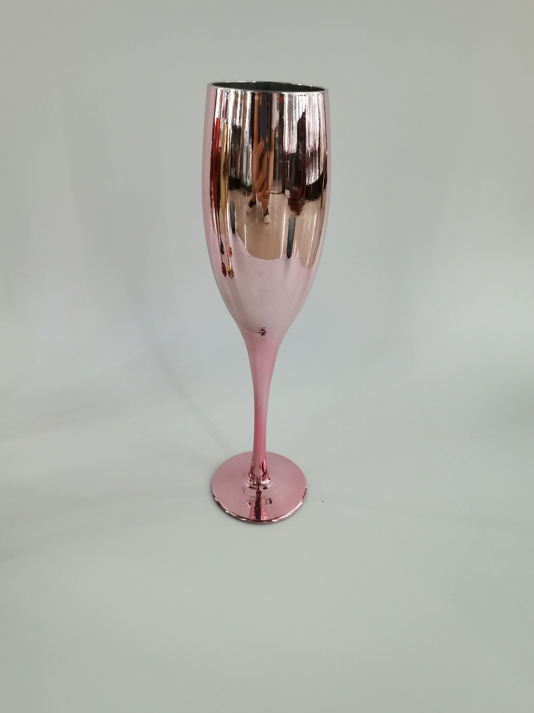 The bar is decorated with electroplated rose gold gold red crystal glass goblet of champagne thumbnail