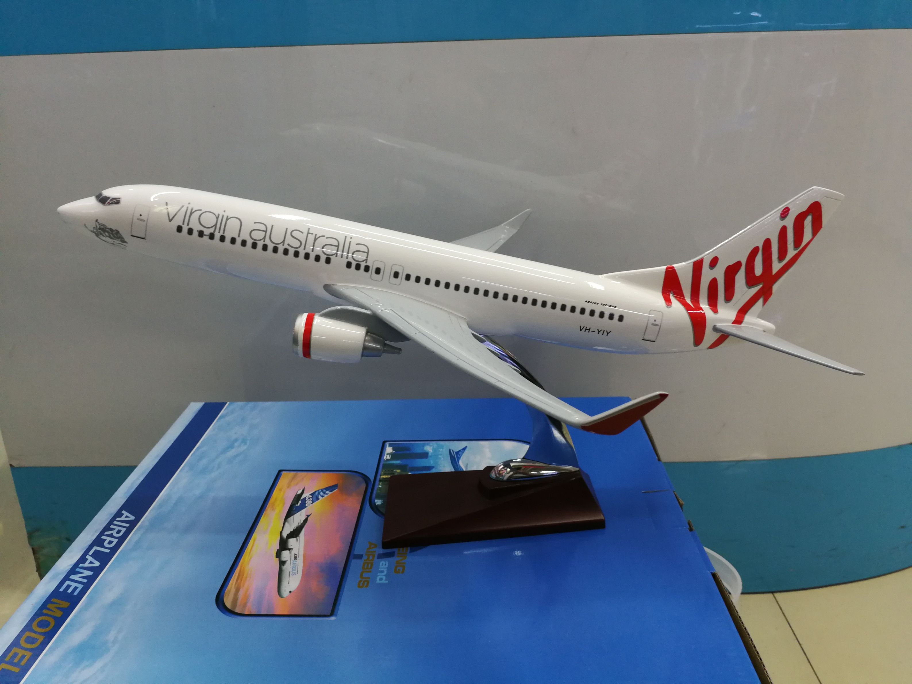 Model aircraft (Virgin Australia B737-800 aircraft) emulates aircraft synthetic resin model aircraft